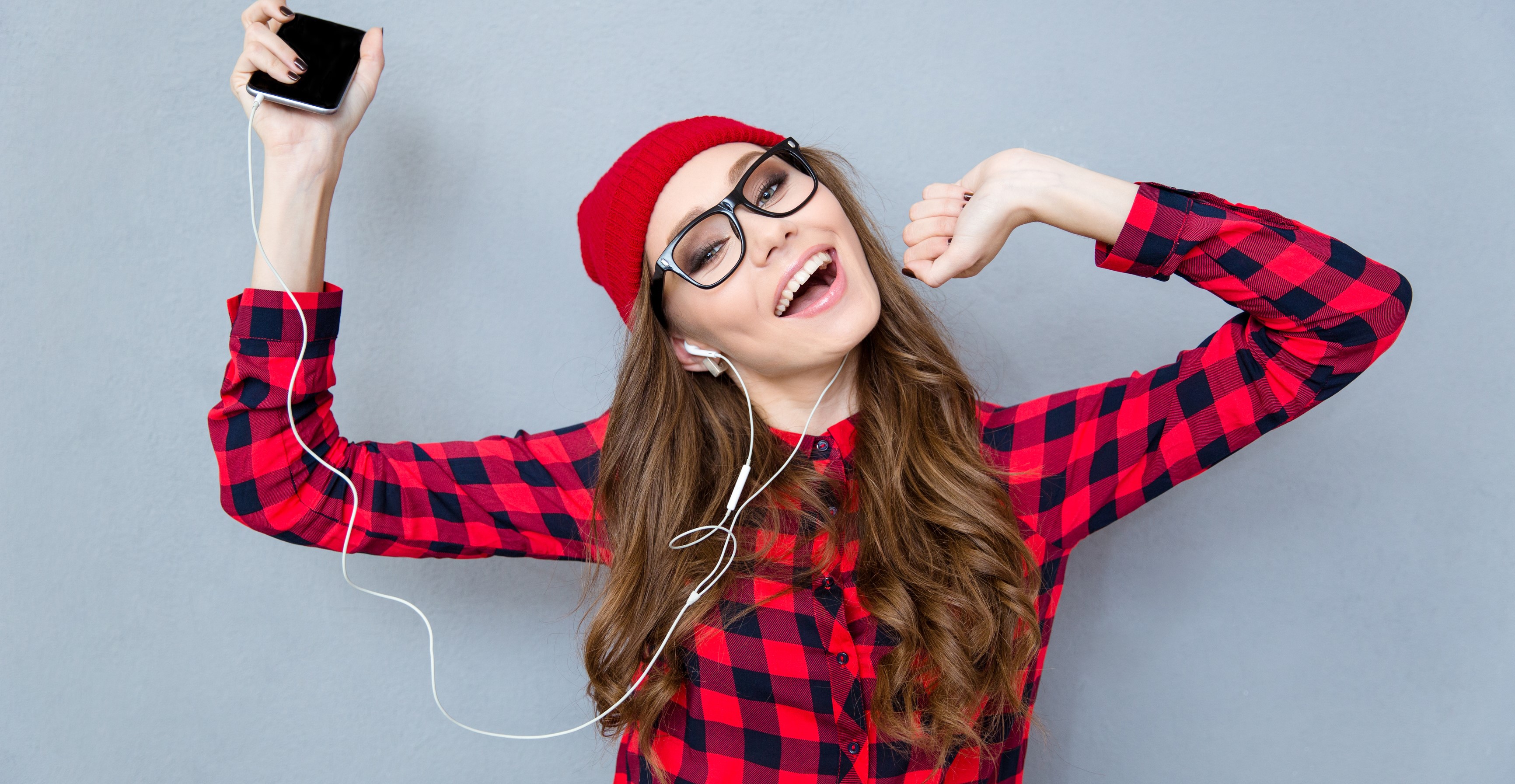 woman listening to headphones dancing dreamstime_xl_62137945 (2) - Job