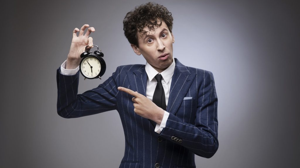 business man pointing to clock time concept dreamstime_m_90222171 Job