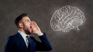A man screams at the brain.