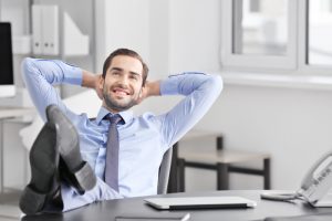 man relaxing in the office