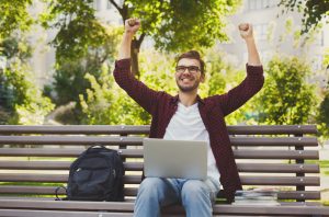 successful man at his computer