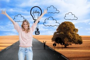 Composite image of a full length shot of a smiling woman who has her arms raised up