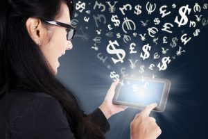 Businesswoman making money online with tablet