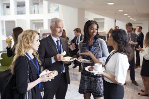 Delegates Networking During Conference Lunch Break