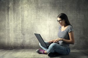 Woman Using Laptop, Happy Girl in Glasses on Notebook, Young Adu